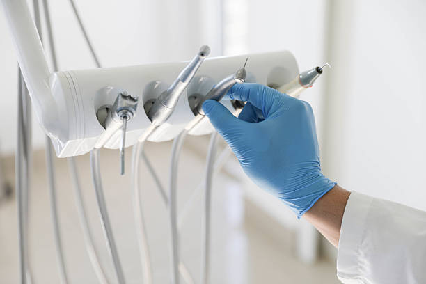 Professional Tooth Extraction technician working in Menlo Park, CA
